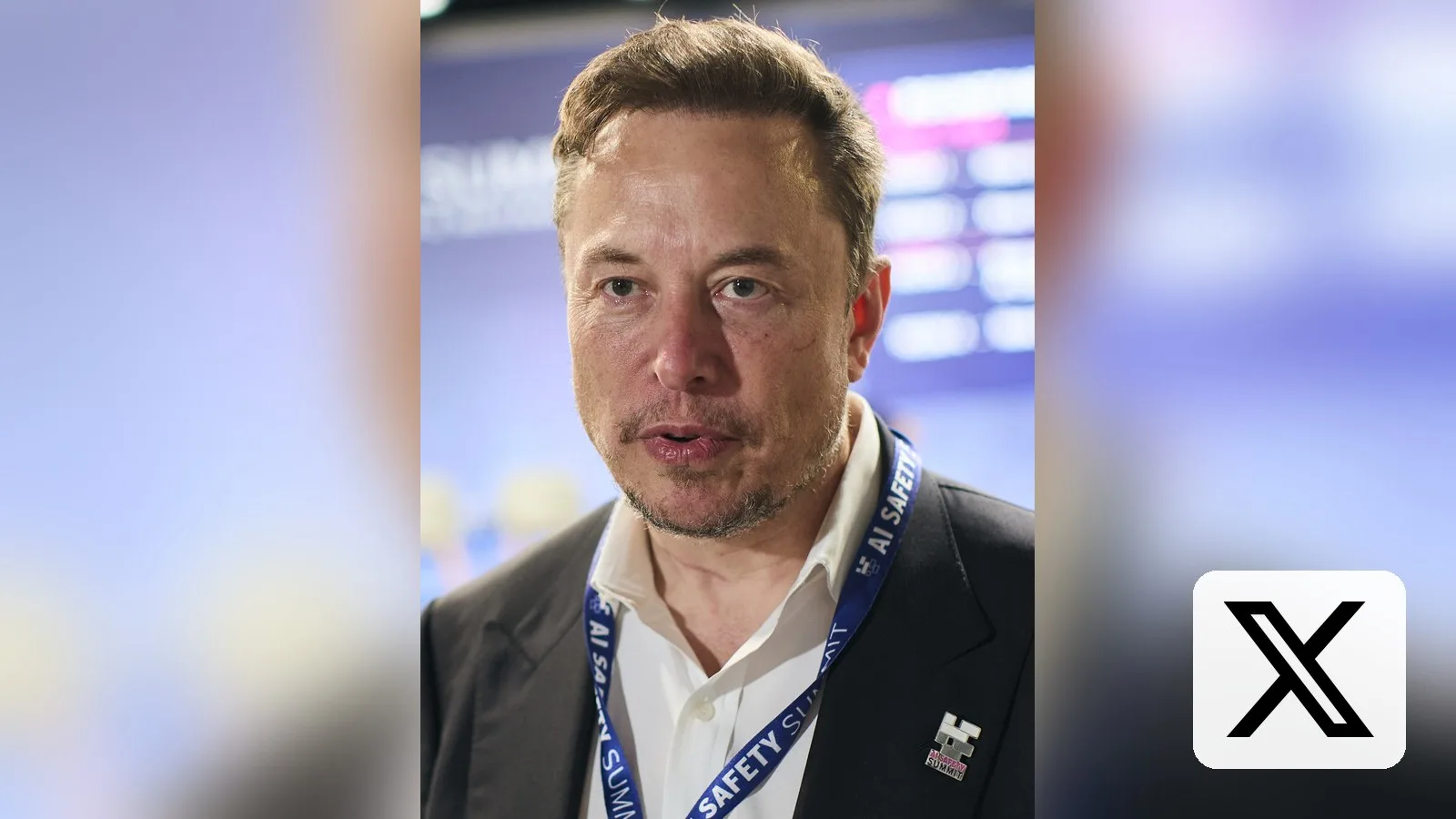 Elon Musk in 2023, with the X logo